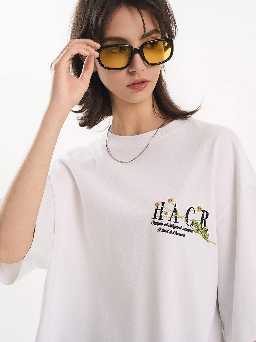 harshandcruel ] floral typography, heavy-duty embroidered tee