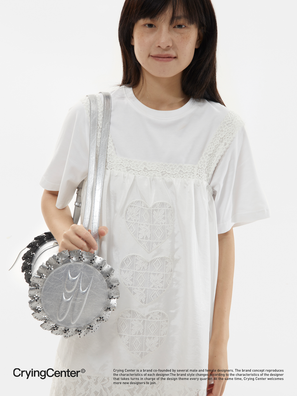 CryingCenter silver-toned leather lace cylinder shoulder cross-body bag