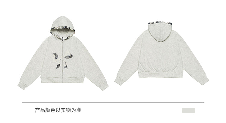 سترة BLACKBB من الدانتيل ذات سحاب ومطرزة ومزودة بفيونكة