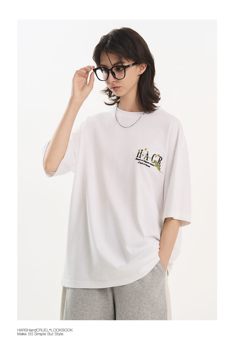 harshandcruel ] floral typography, heavy-duty embroidered tee