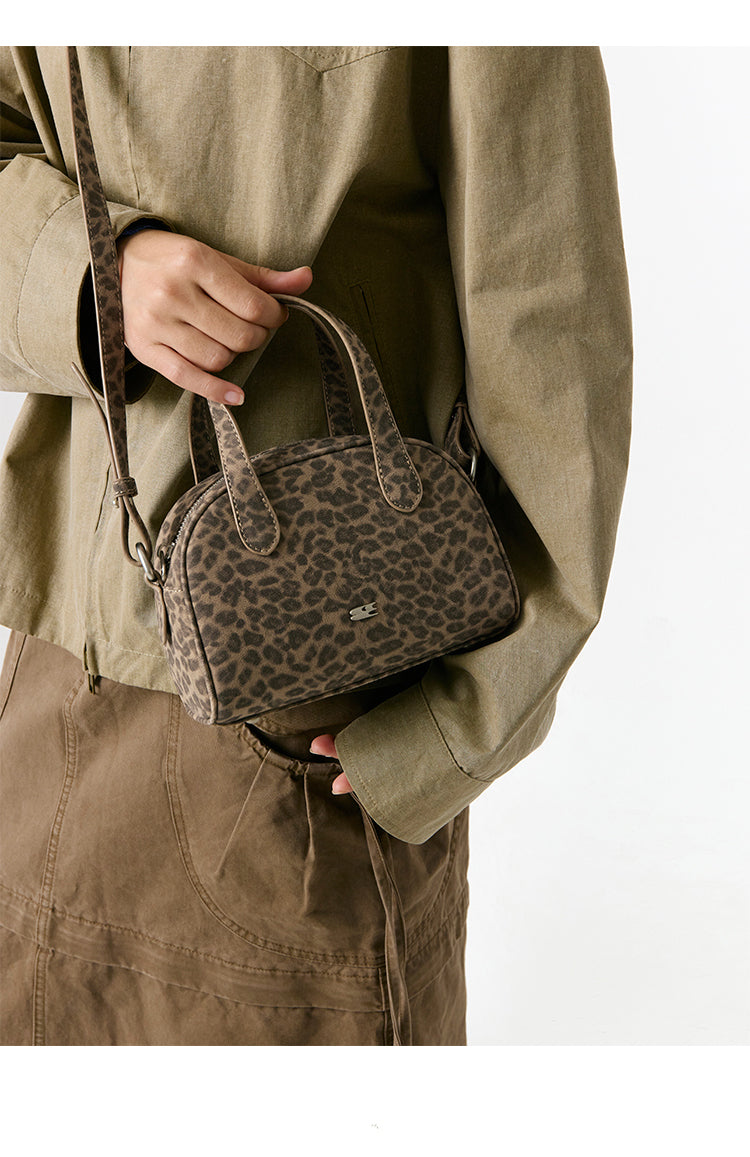 The CryingCenter leopard print small leather Boston bag