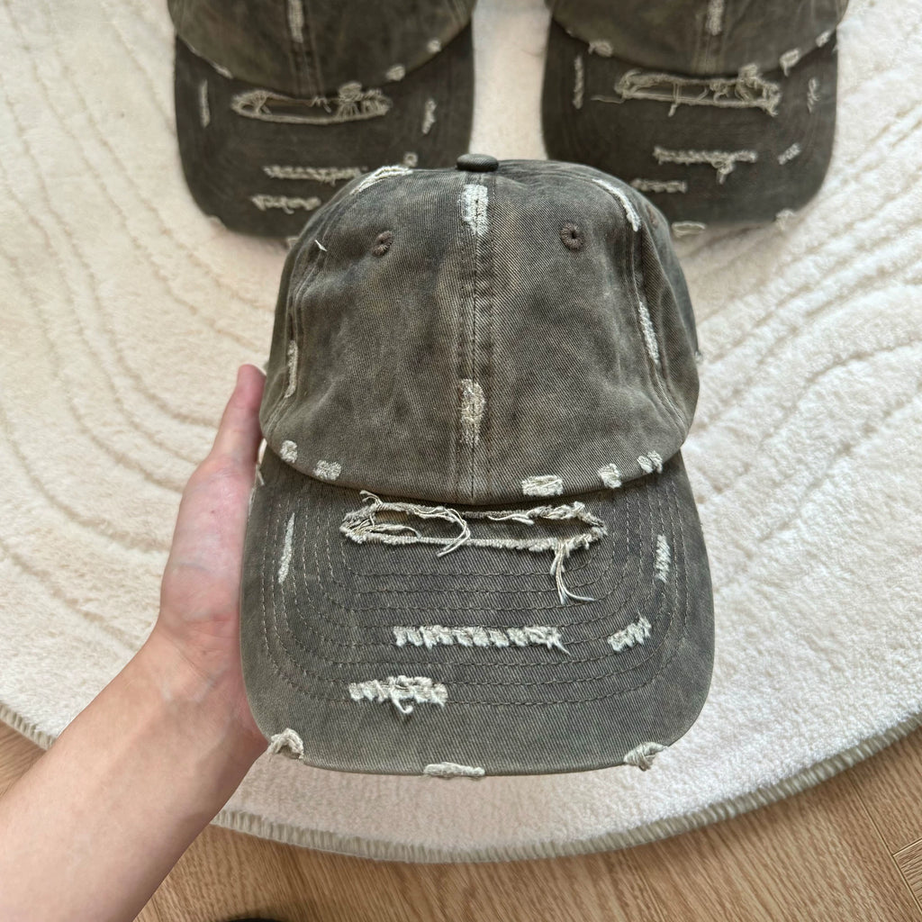 Erole Stains and Damages Baseball Caps
