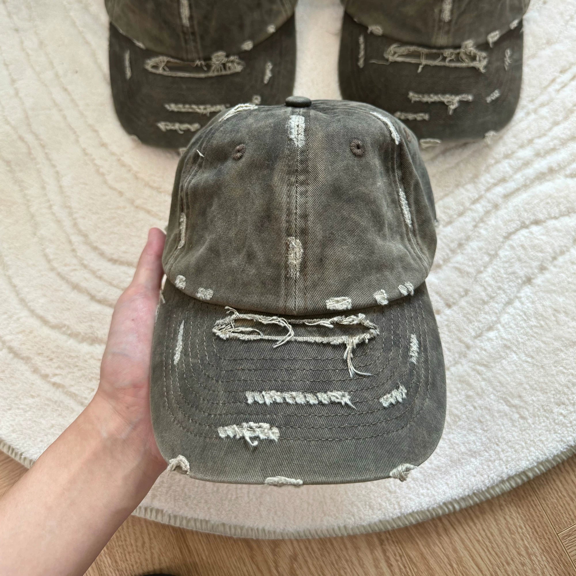 Erole Stains and Damages Baseball Caps
