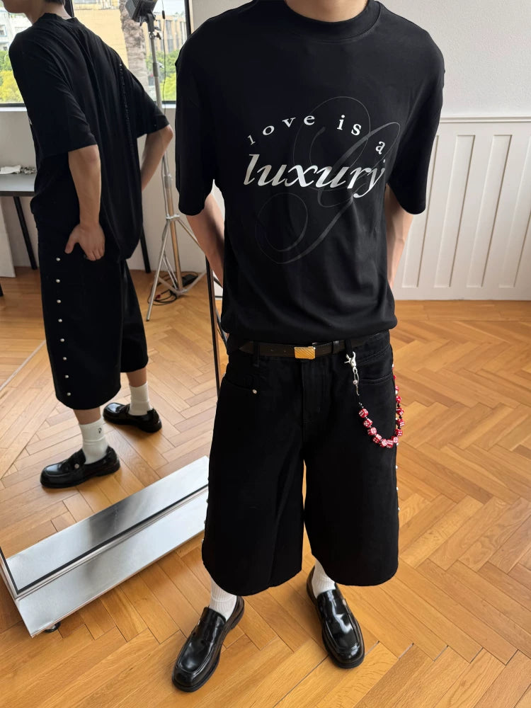 TERRAINCOGNITA Metallic Brushed Lettering Film Printed Loose Tee