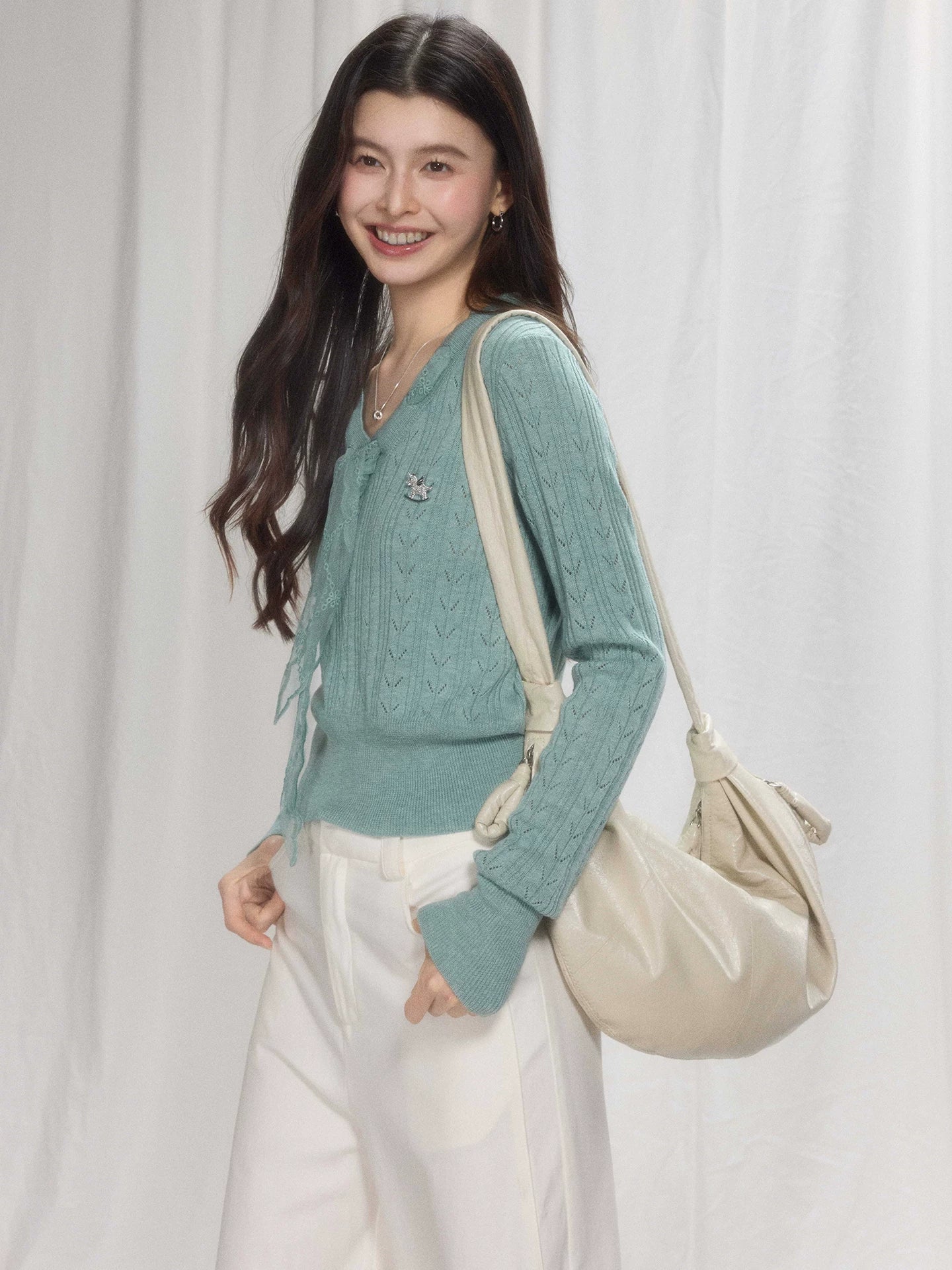 TYANG Hollow Twisted Waist Lace Streamer Knitted Sweater