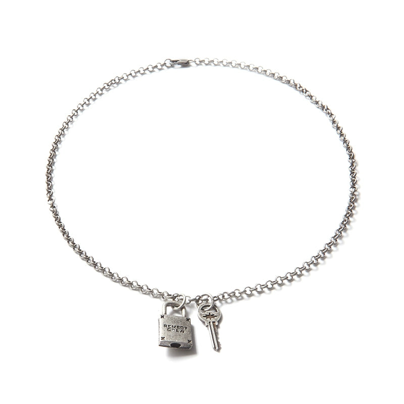Remedy octagram niche key lock necklace