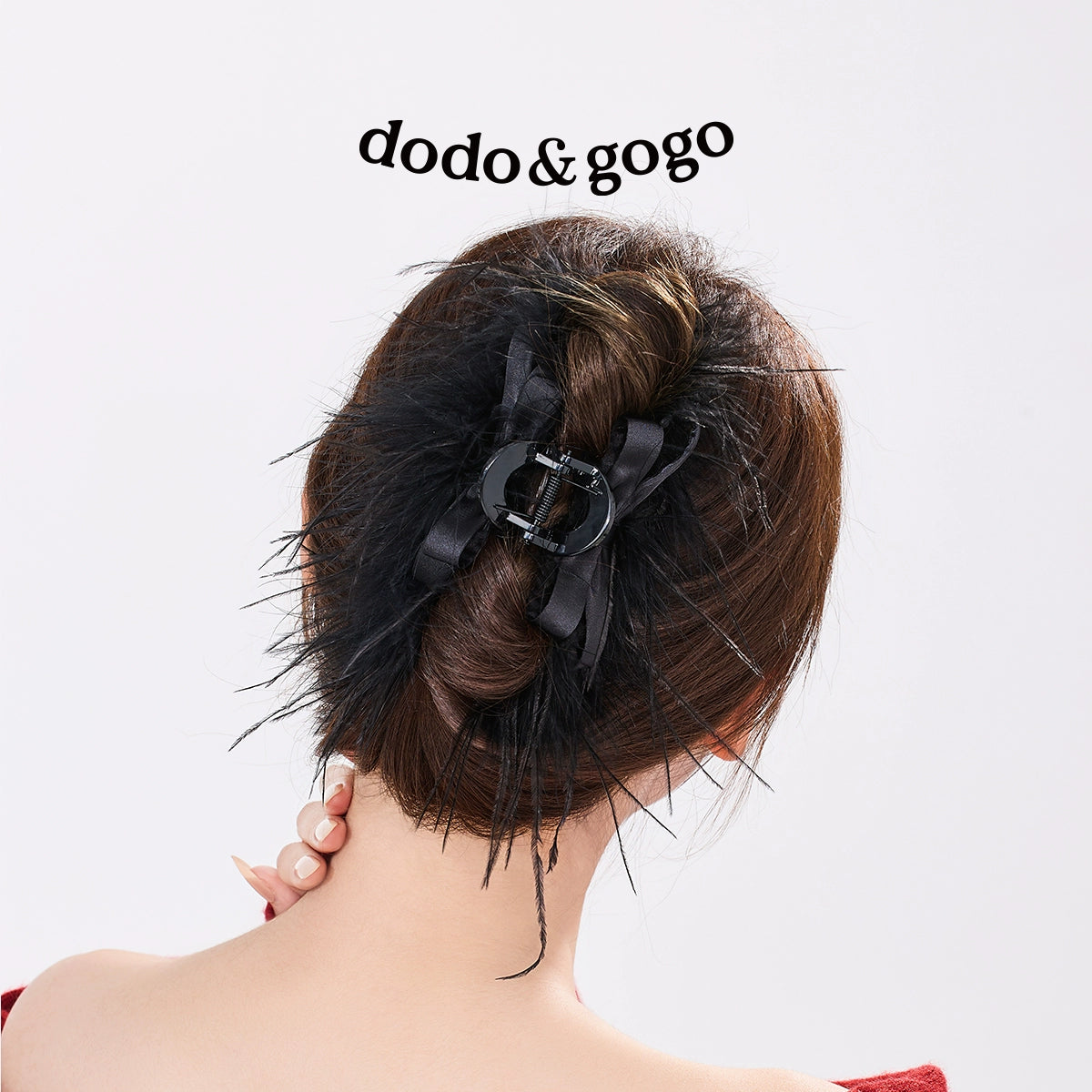 DODOGOGO Feather Bow Clip