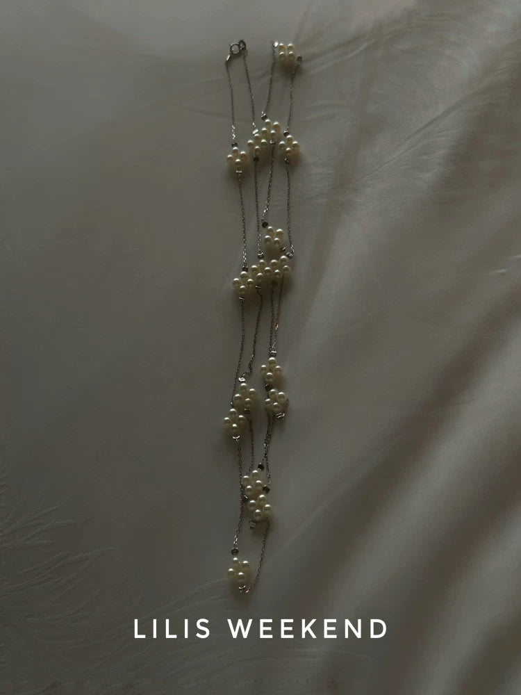 Lilis Weekend Cross Petal Pearl Necklace