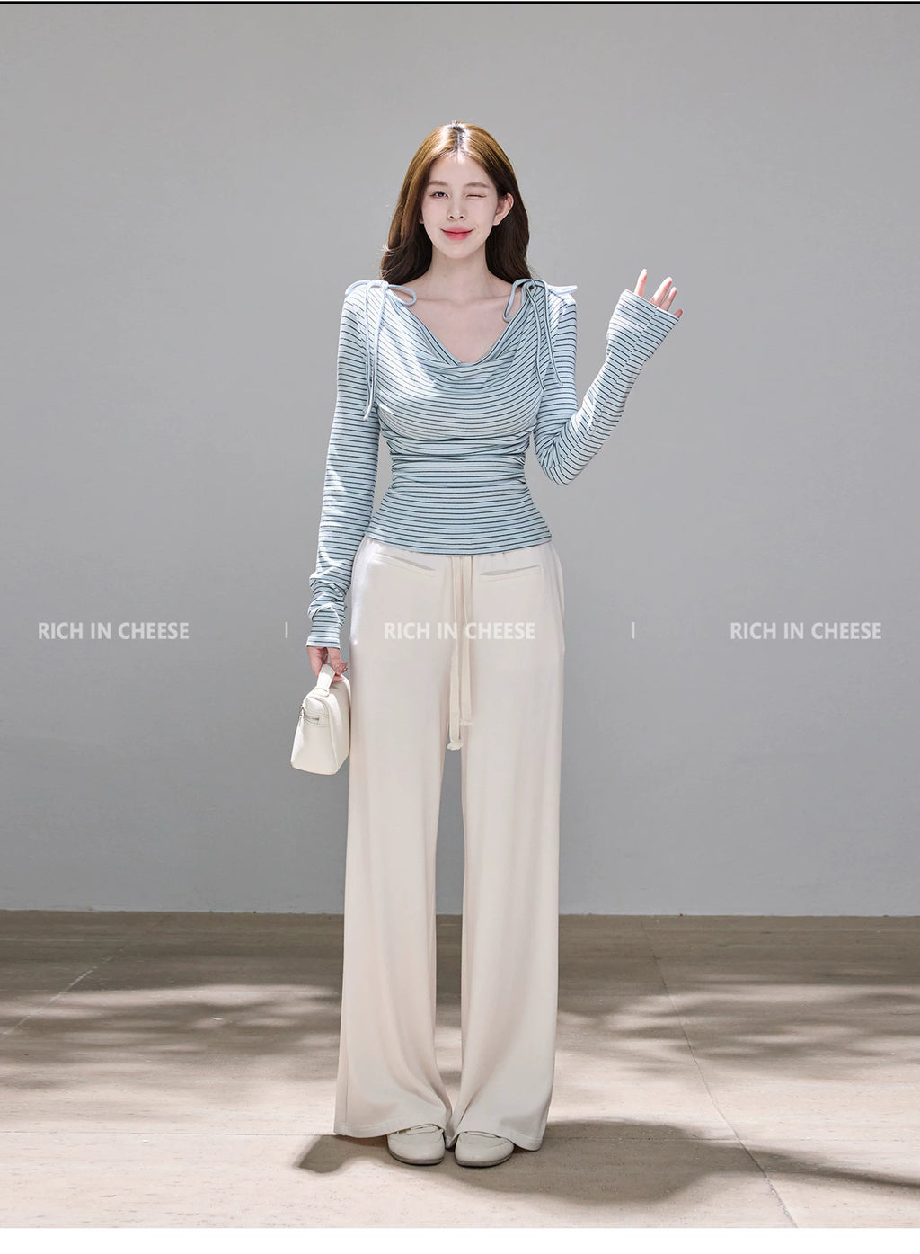 RICH IN CHEESE Striped Bow Knitted Long Sleeve