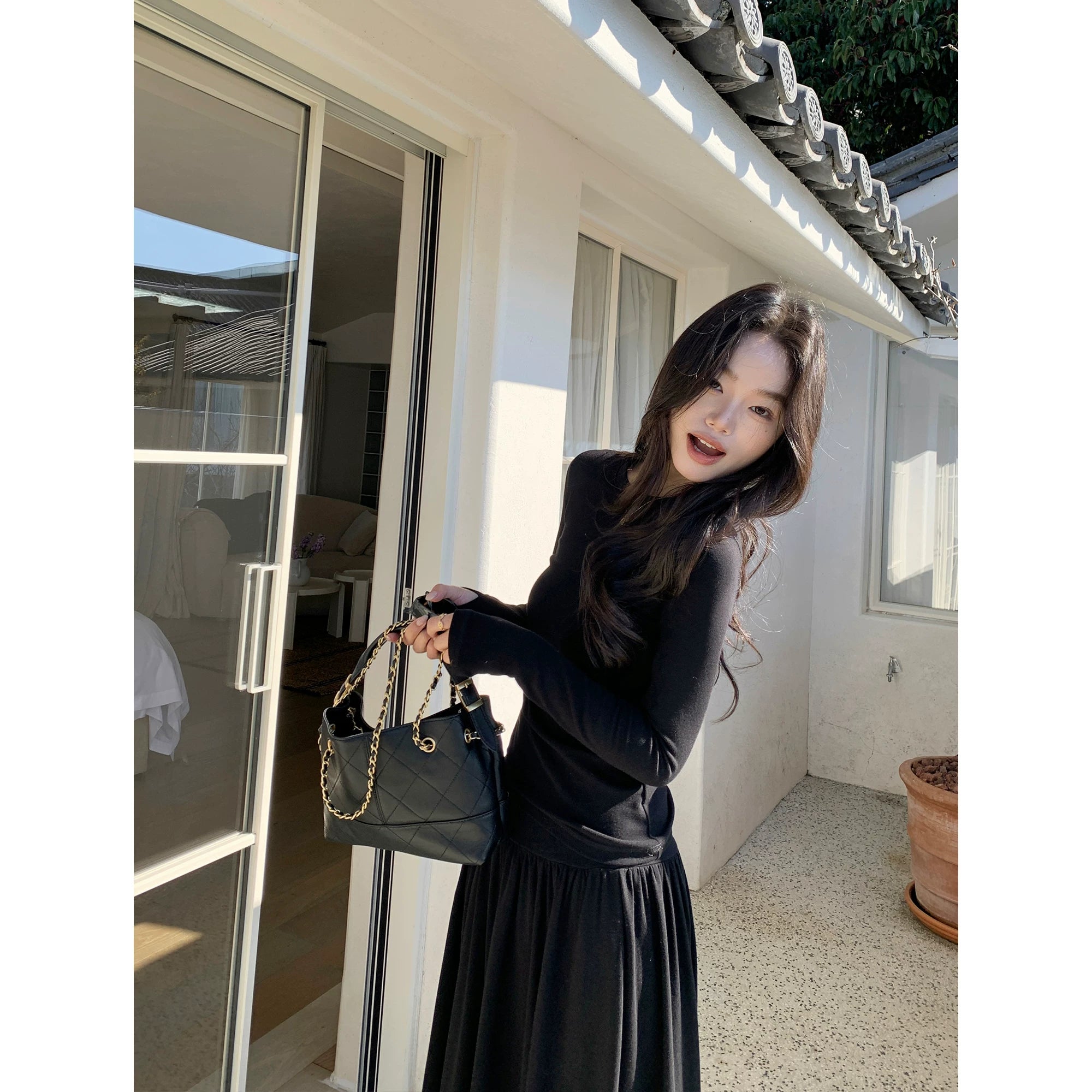 Pusumede Slim-fit Long-sleeved Knitted Sweater Pleated Drape Skirt Set