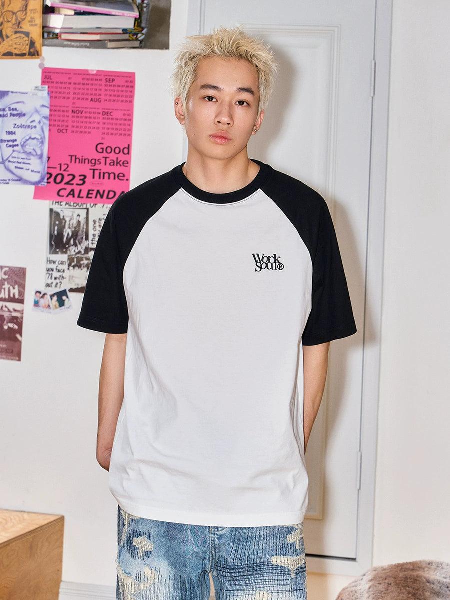 NICEBAD Contrasting Color Raglar Sleeve Embroidery Tee