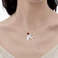 NO SOLUTION White Dish Shell Swallow Sterling Silver Necklace