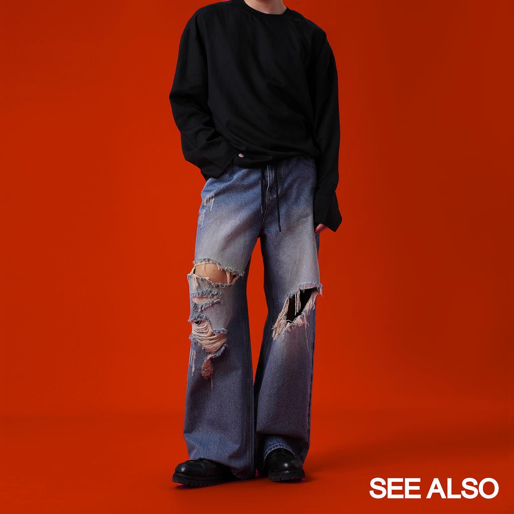 SEE ALSO ripped stitching loose washed wide leg jeans
