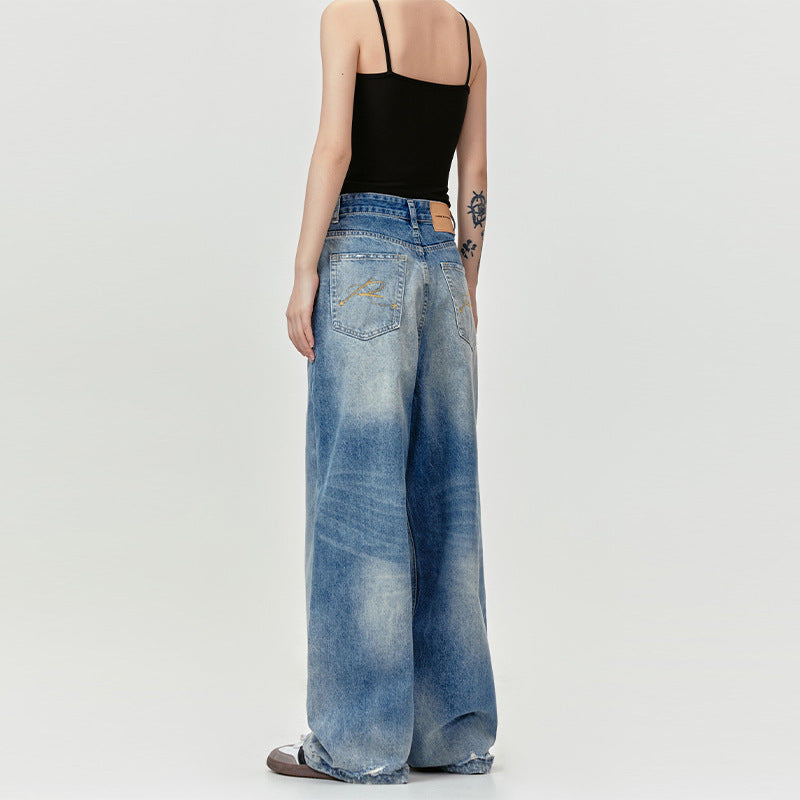 MADEEXTREME washed blue cat whisker embroidered flower Jeans