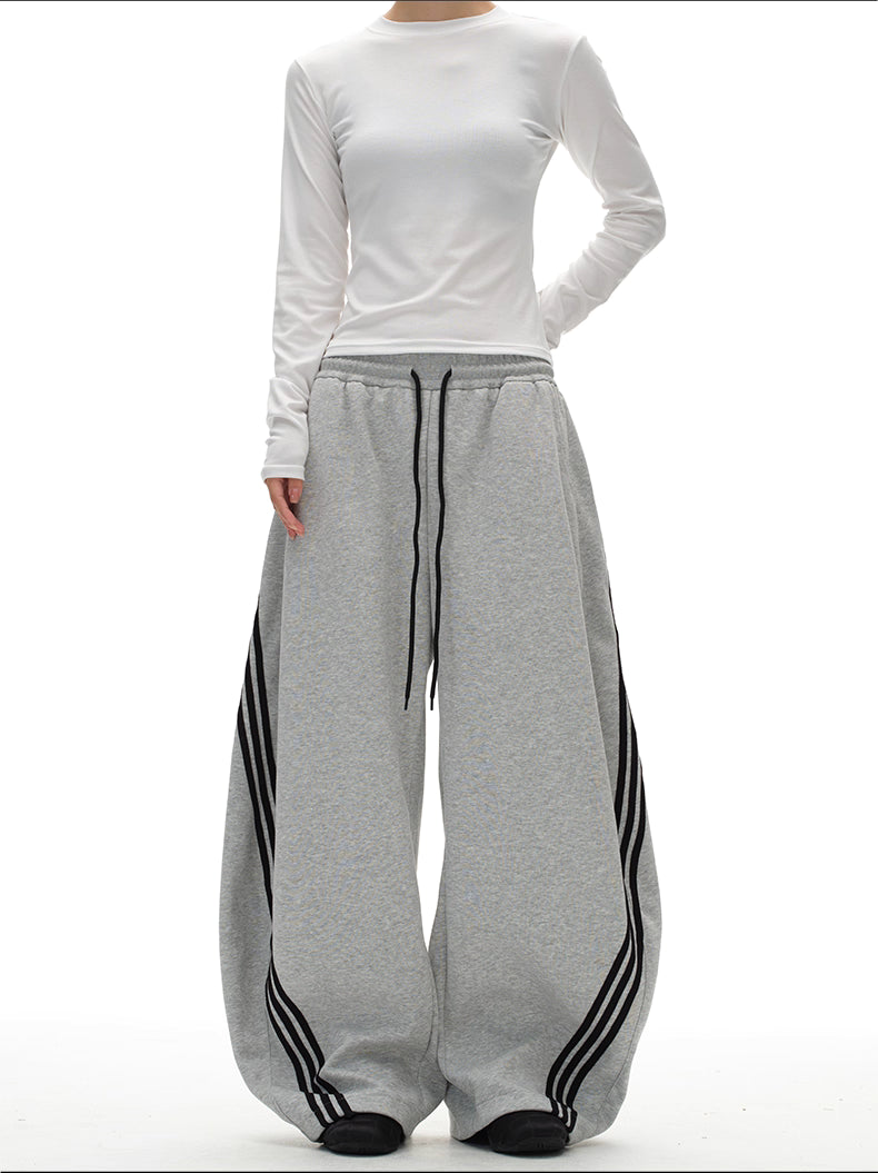 BTSG three-bar striped draped scimitar sweatpants