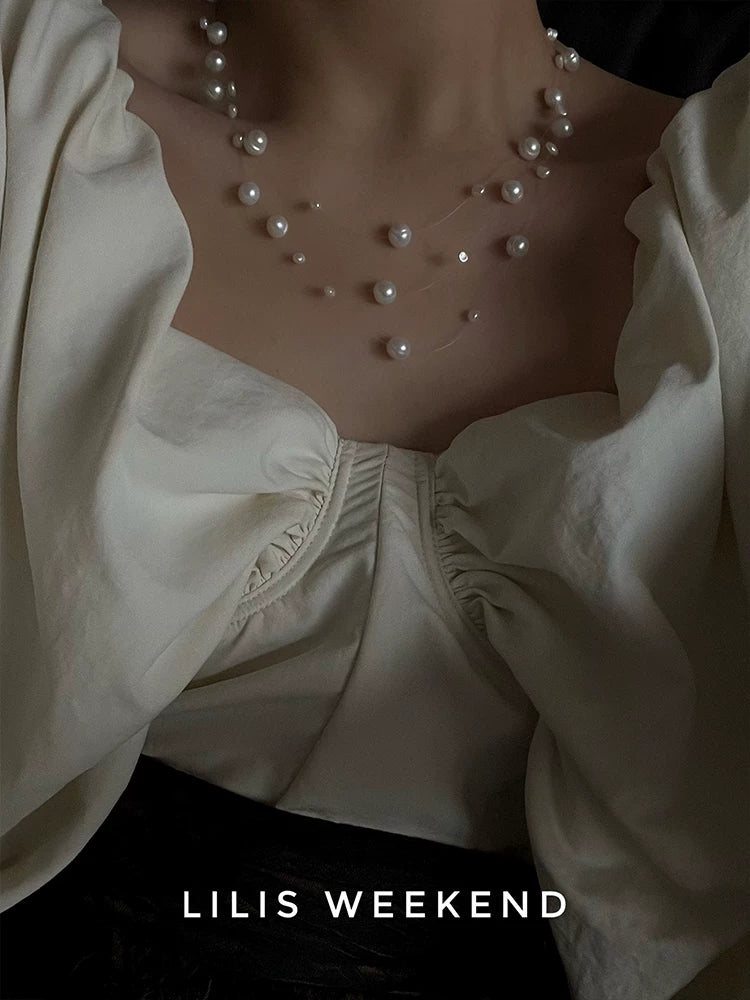 Lilis Weekend Triple Floating Pearl Niche Necklace