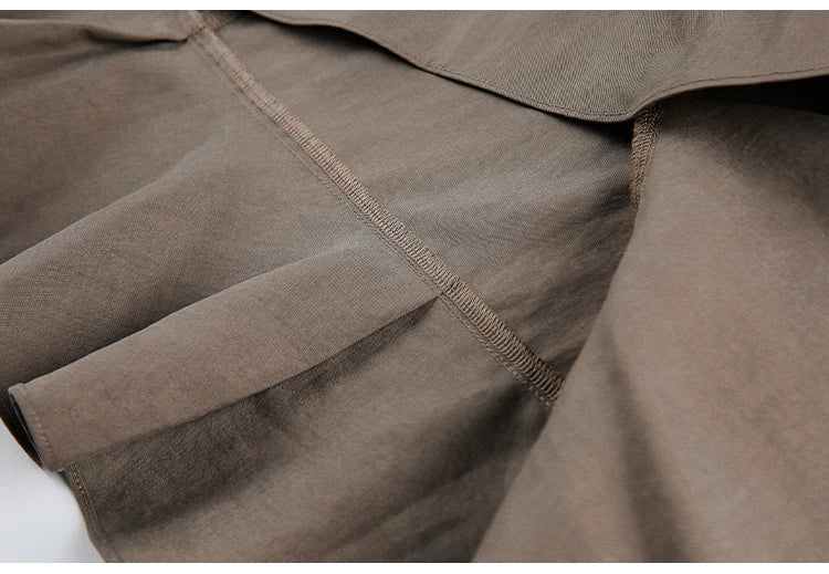JIKOO Rivet Asymmetrical Pendulum Skirt