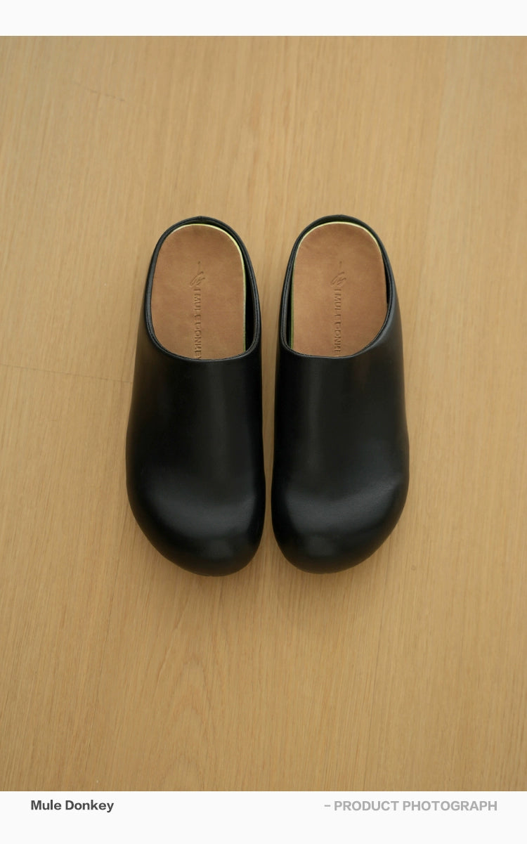 Donkey Wears A Bag Head Outside  One Foot on Versatile Birkenstocks