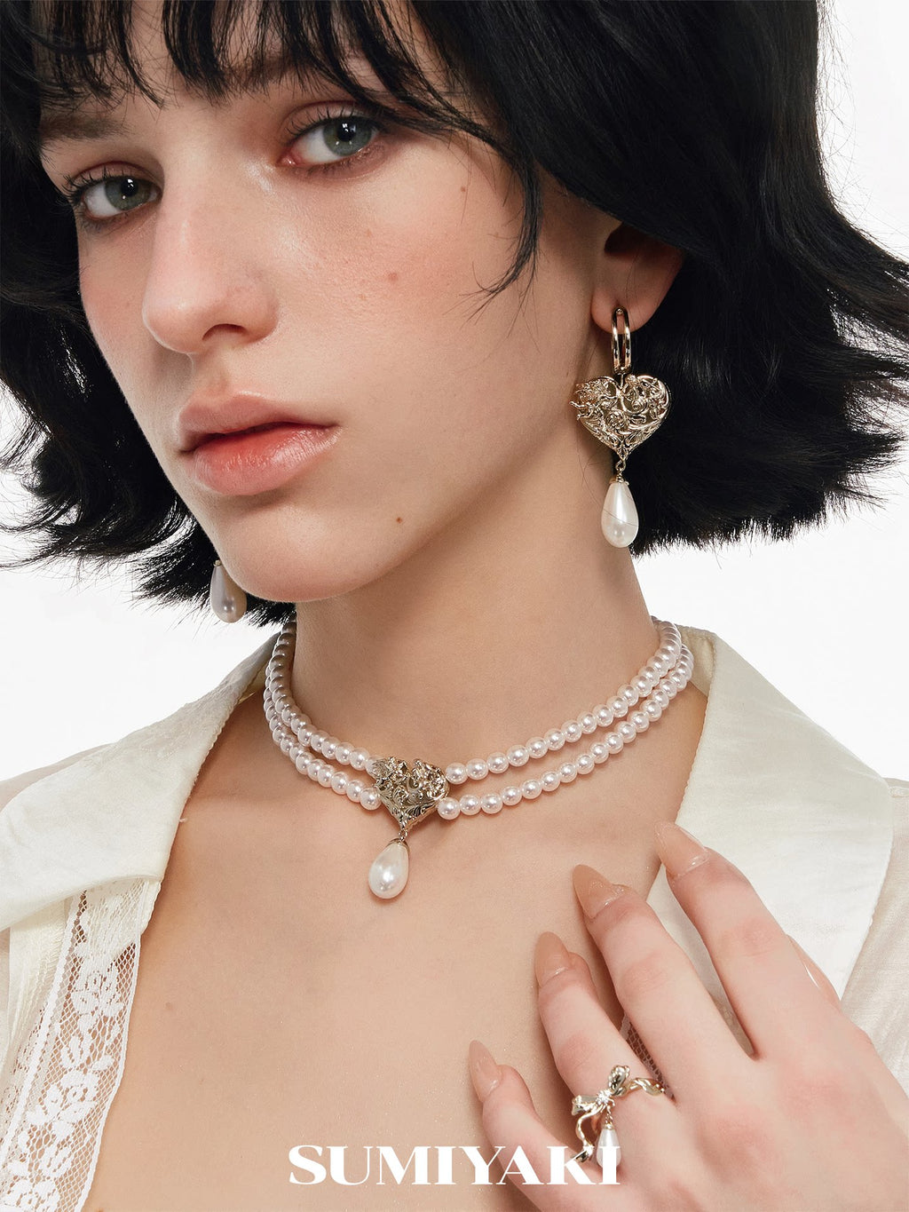SUMIYAKI Double-Sided Embossed Pearl Clavicle Chain