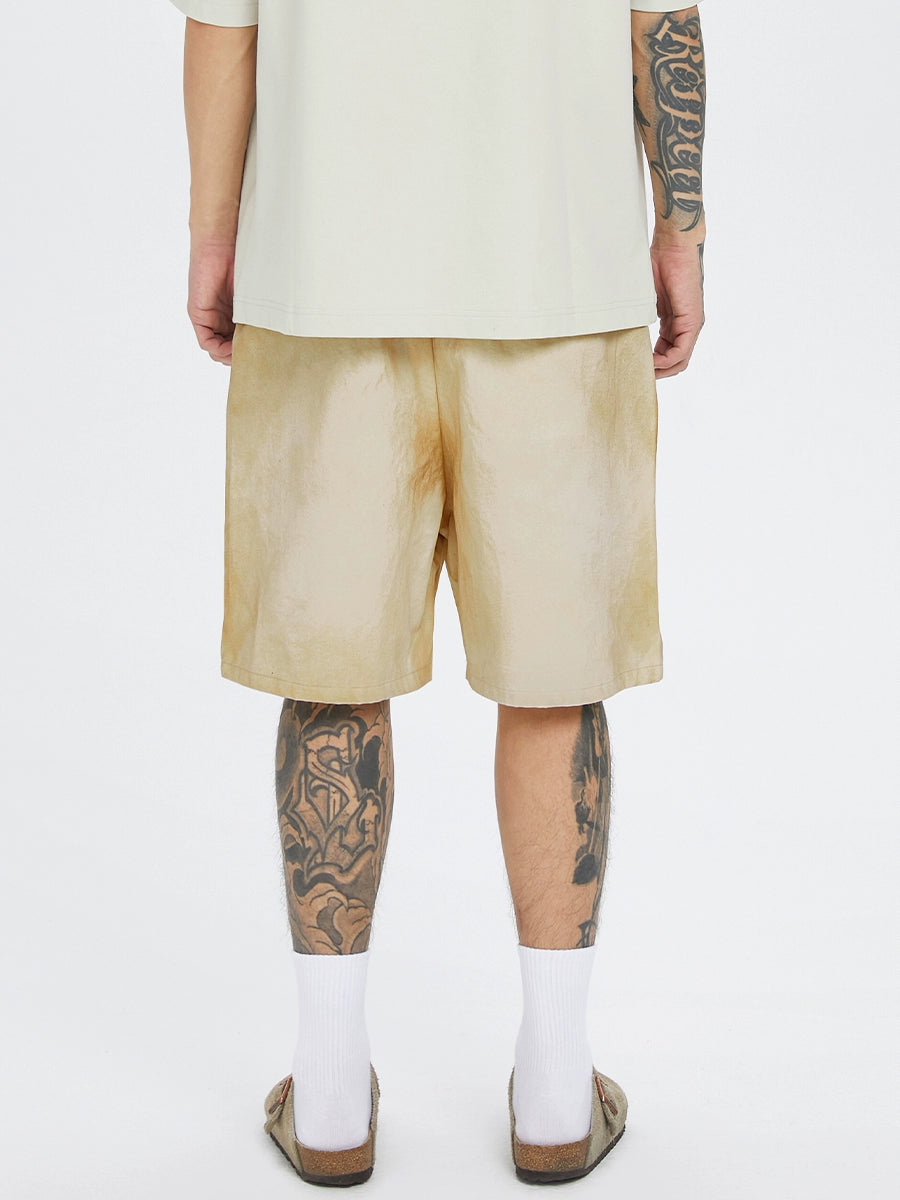 F2CE old loose silhouette mud-dyed printed shorts