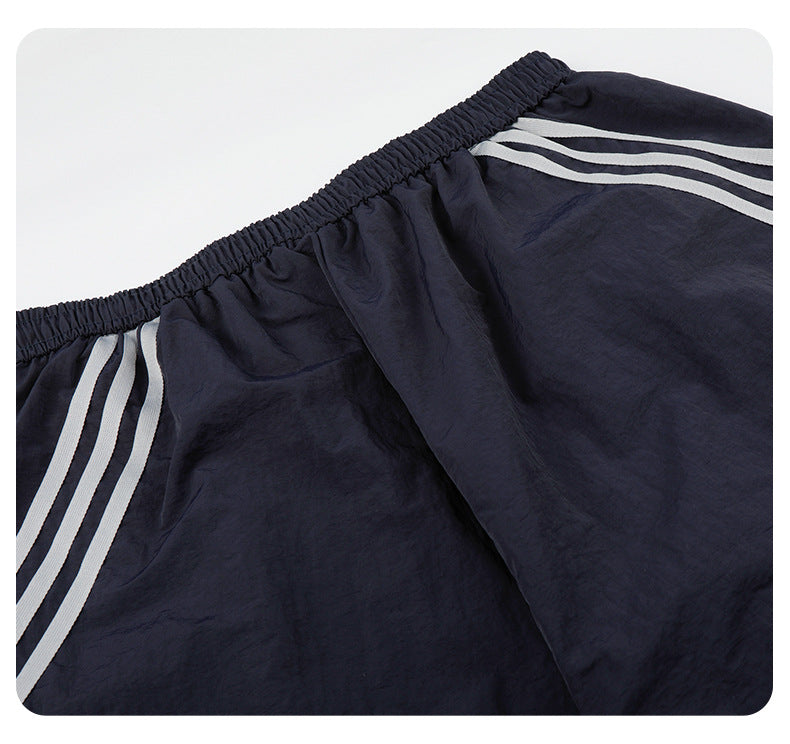 11KN Loose and Versatile Three-bar Sports and Leisure Shorts