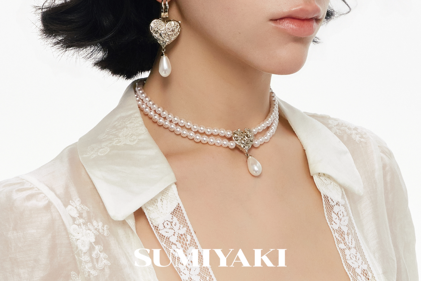 SUMIYAKI Double-Sided Embossed Pearl Clavicle Chain