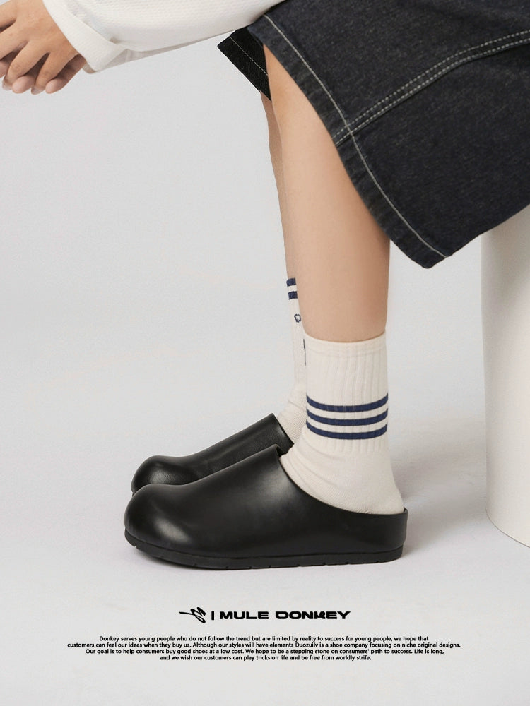 Donkey Wears A Bag Head Outside  One Foot on Versatile Birkenstocks