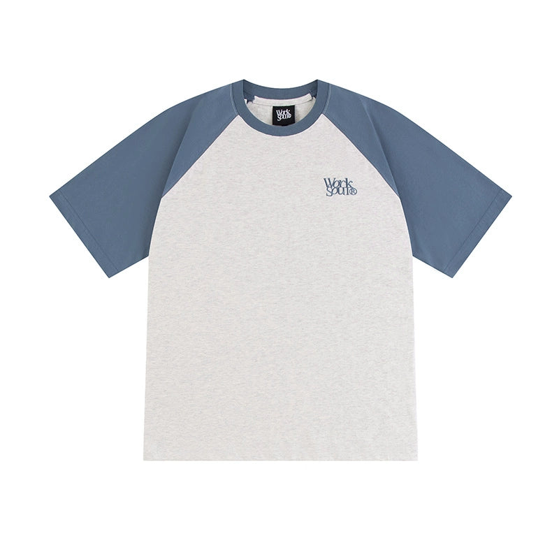 NICEBAD Contrasting Color Raglar Sleeve Embroidery Tee