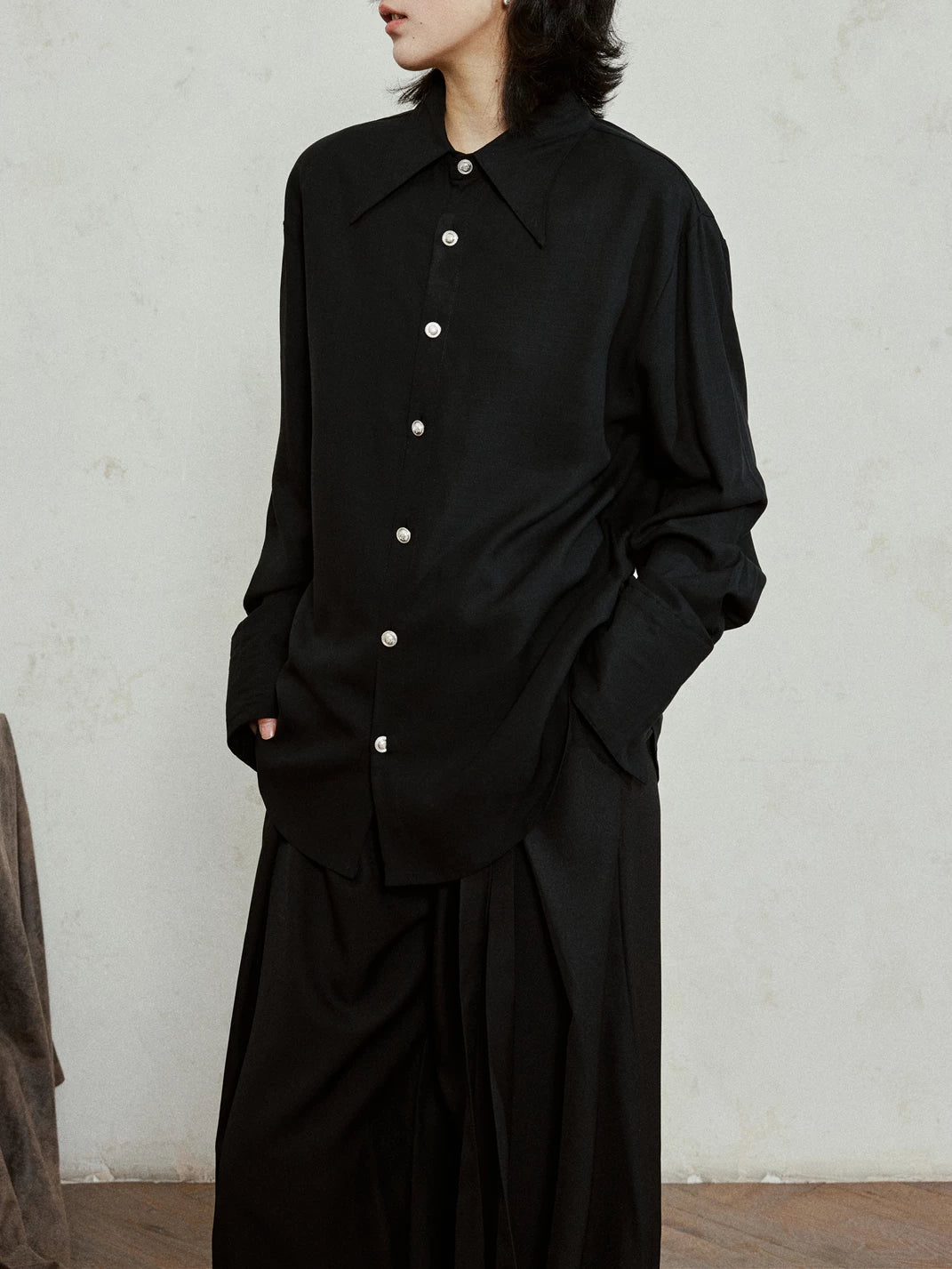 SUNYVONNE Embossed Buckle Loose Pointed Neck Stacked Long-sleeved Shirt