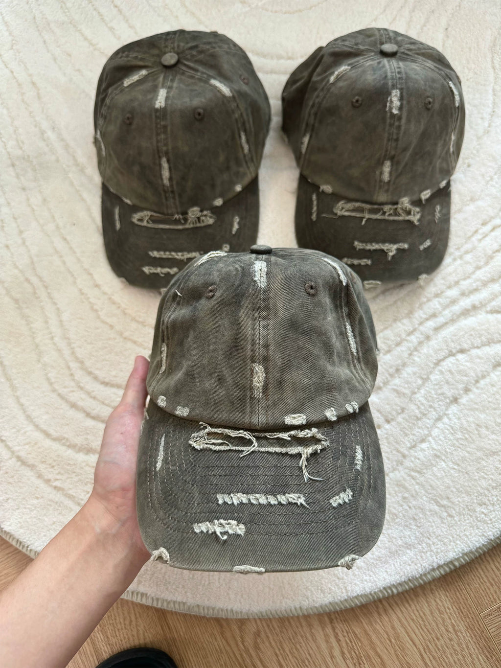 Erole Stains and Damages Baseball Caps