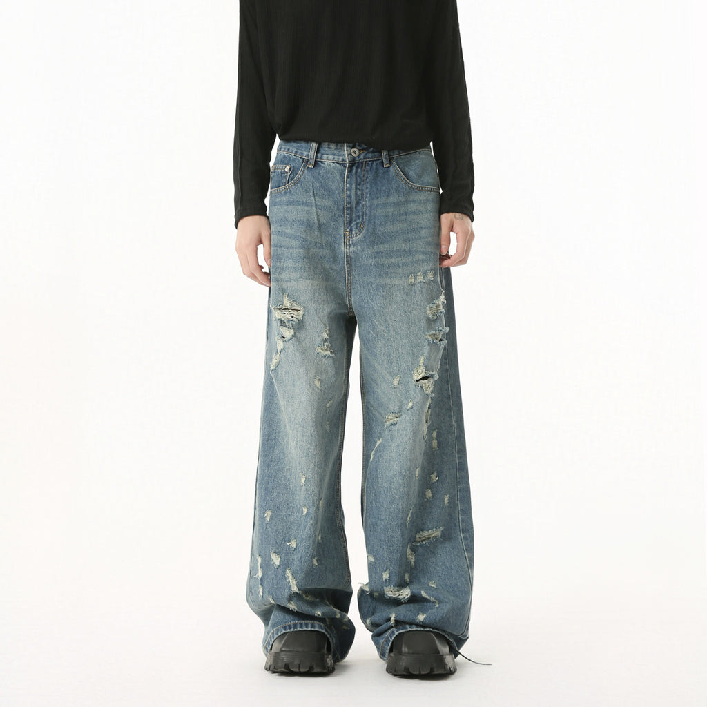 MTLCLOTHES Irregularly Worn Old Ripped Jeans