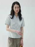 VOOE Flip V-Neck Pinch-pleated Loose Commuter Shirt