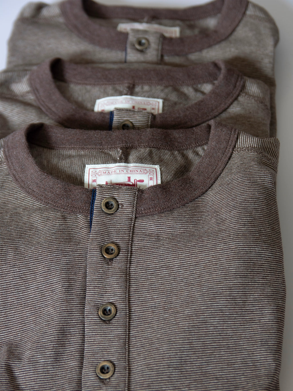PrintAce Splicing Four-button Henry Collar Striped Loose Tee