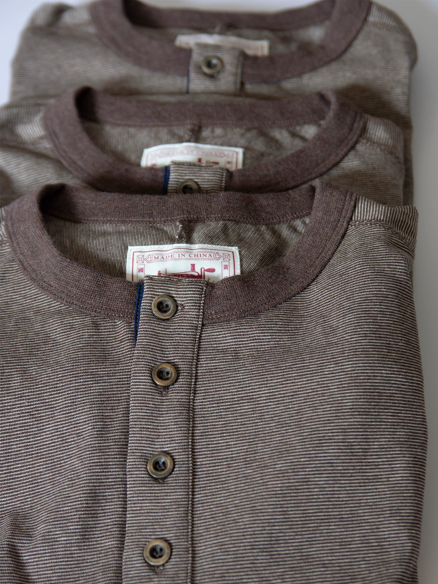 PrintAce Splicing Four-button Henry Collar Striped Loose Tee