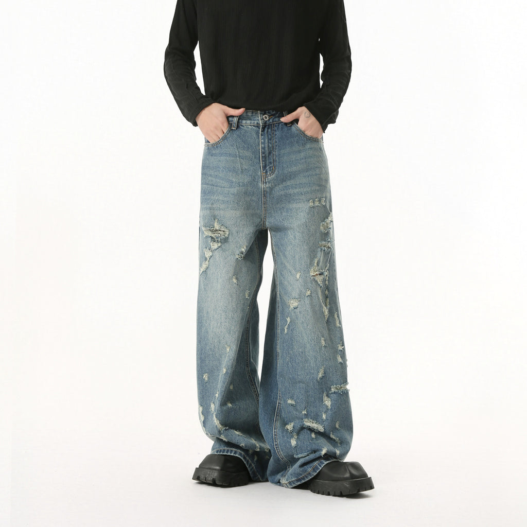 MTLCLOTHES Irregularly Worn Old Ripped Jeans