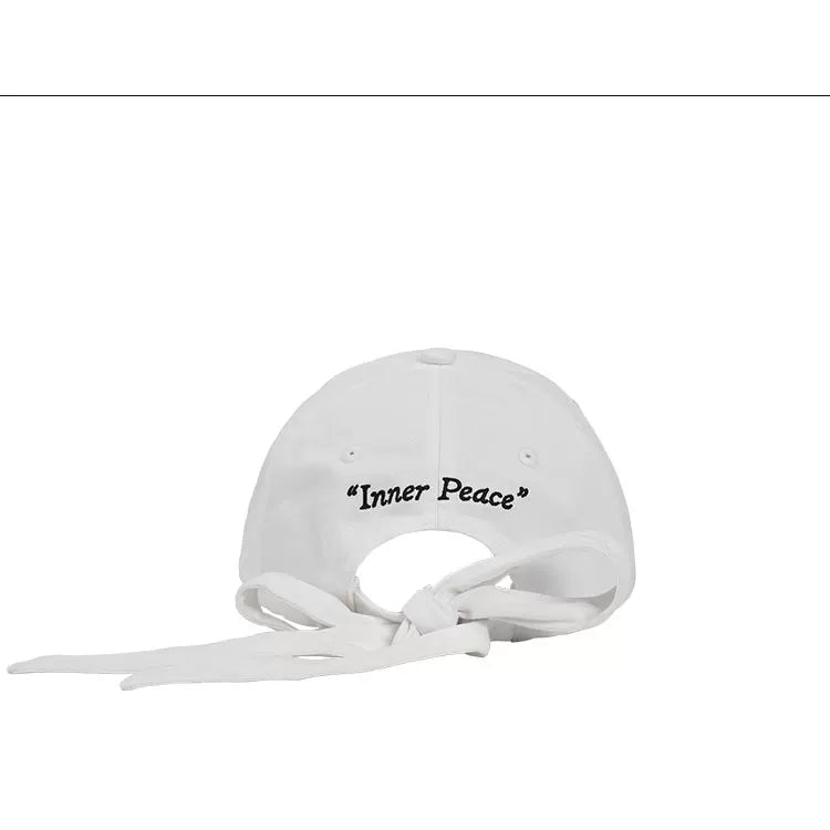 HEADACHE Logo Embroidered Bow Strap Baseball Cap