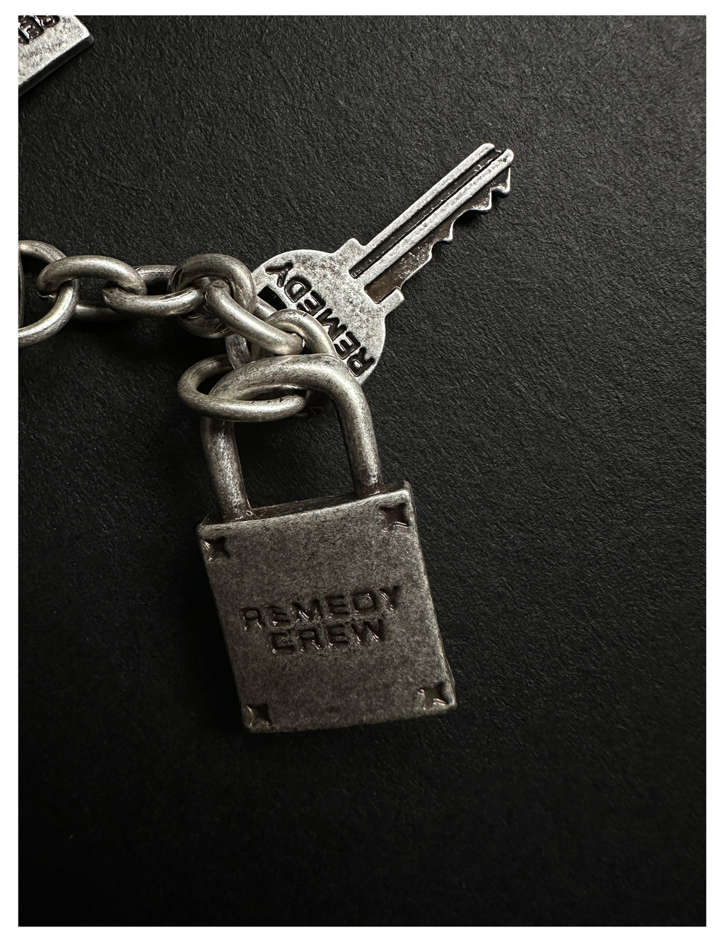 Remedy pendant lock key ring keychain