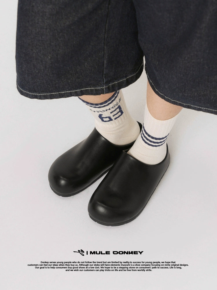 Donkey Wears A Bag Head Outside  One Foot on Versatile Birkenstocks