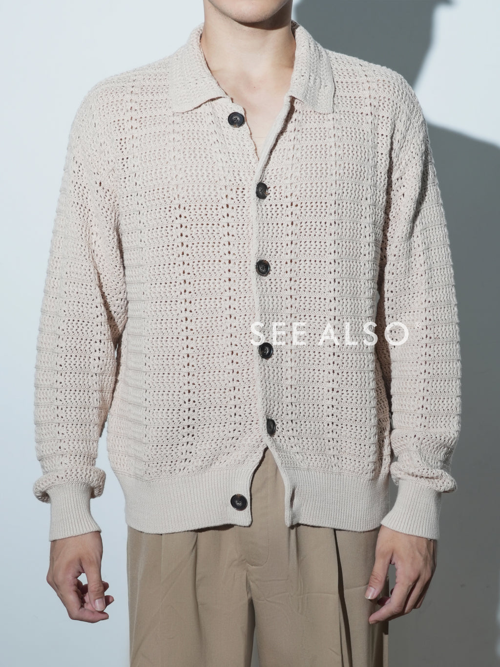 SEE ALSO Minimalist Knitted Cardigan Sweater