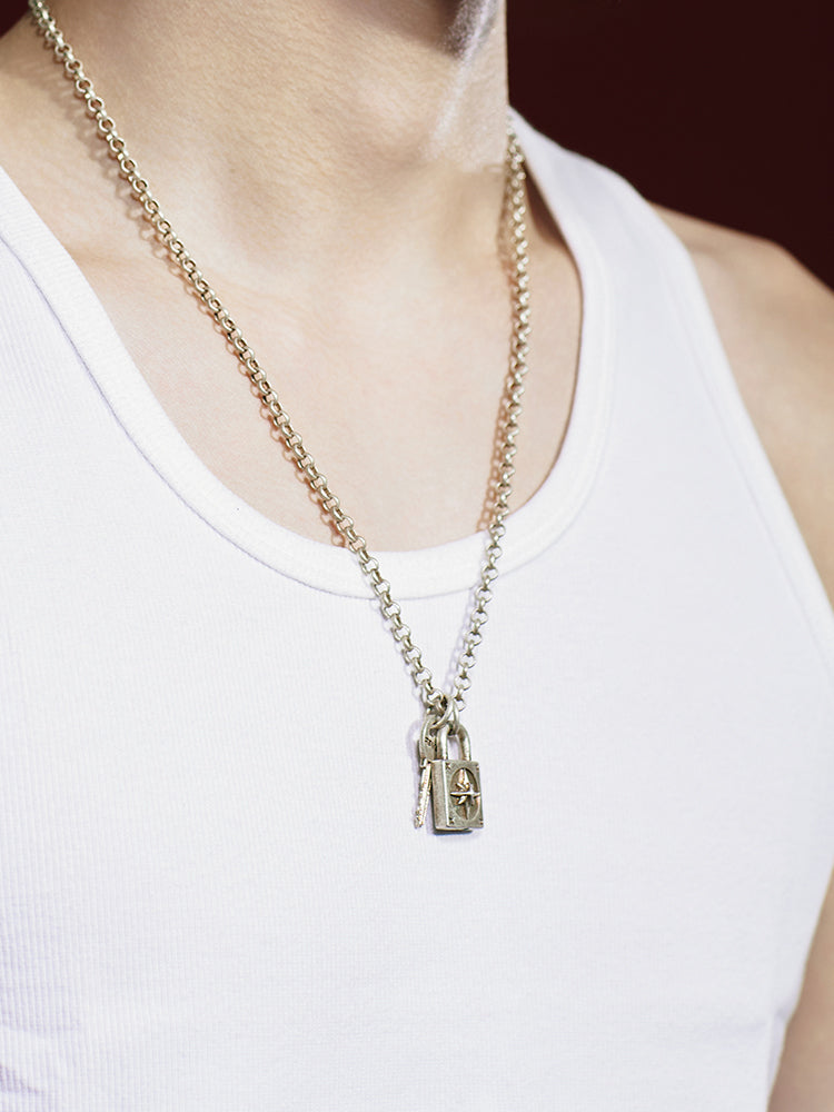 Remedy octagram niche key lock necklace