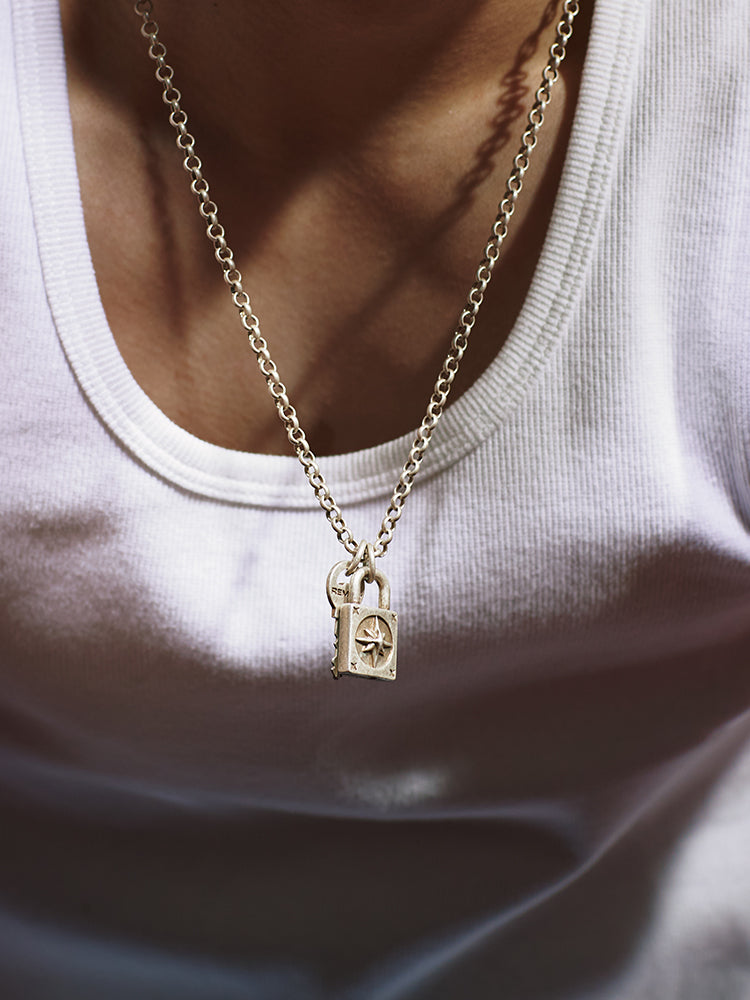 Remedy octagram niche key lock necklace