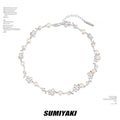 SUMIYAKI Graffiti Line Sense Small Flower Pearl Hollow Necklace