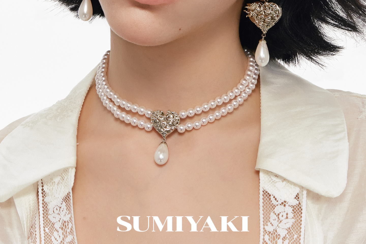 SUMIYAKI Double-Sided Embossed Pearl Clavicle Chain