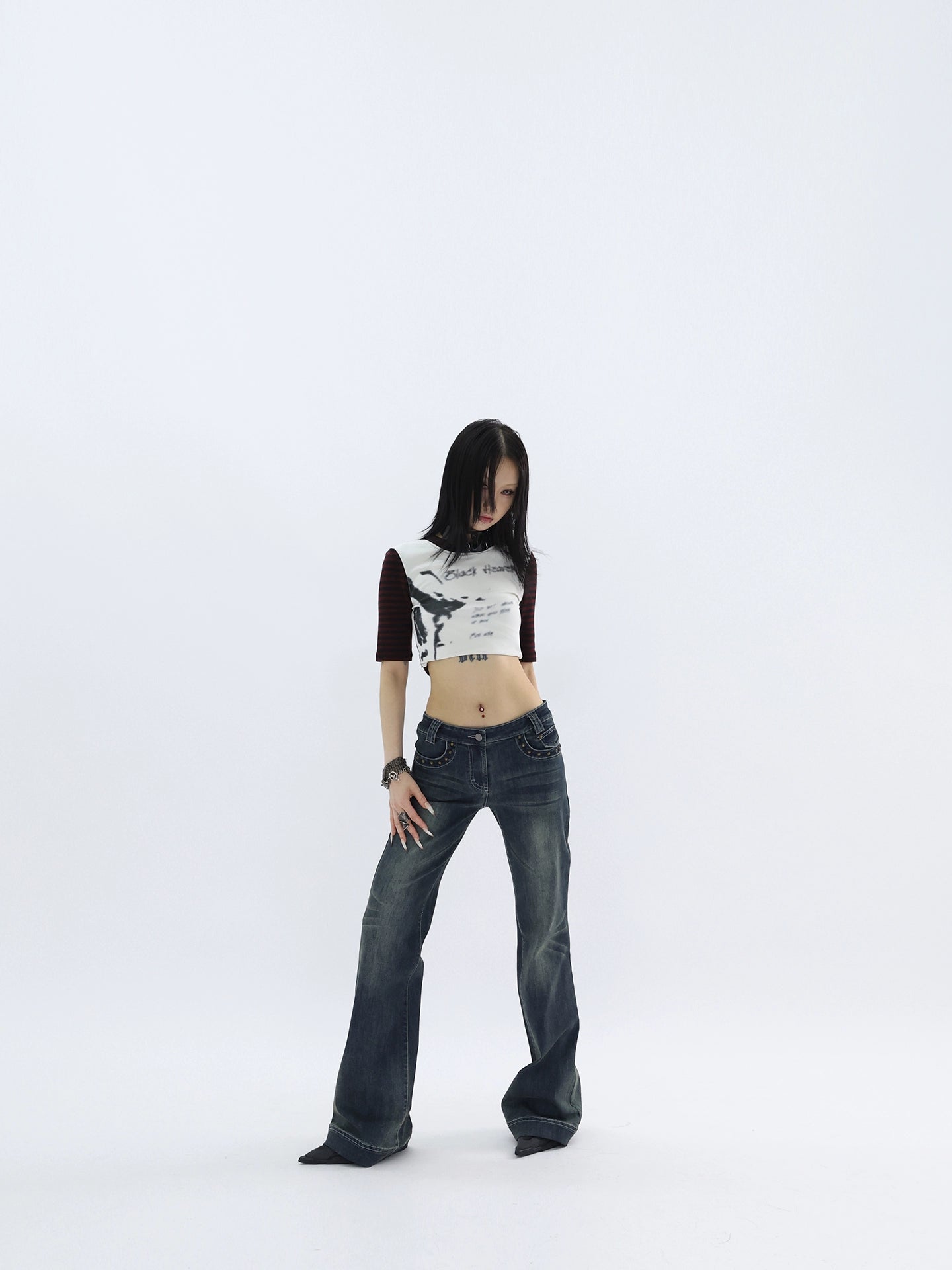 FUZZYKON Trimmed Rivet Skinny Low-rise Flared Jeans