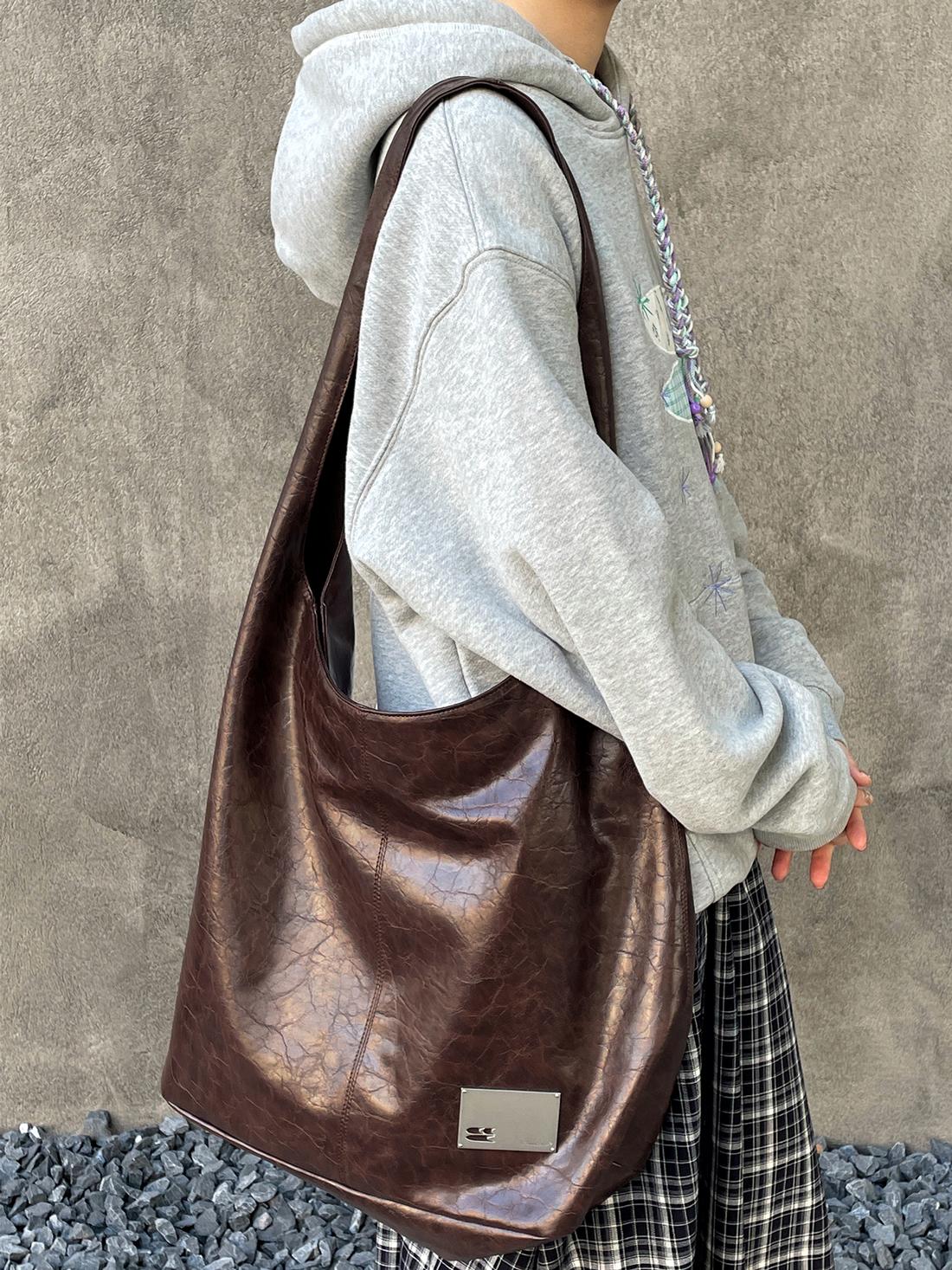 CryingCenter Crack Glossy Oil Wax Crossbody Bag