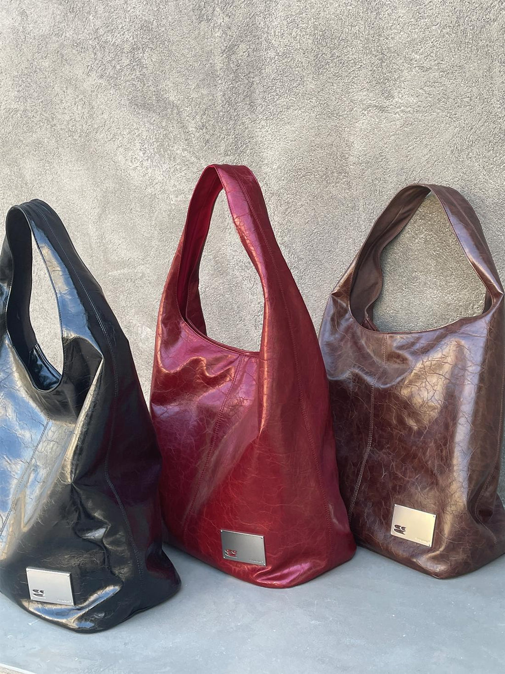 CryingCenter Crack Glossy Oil Wax Crossbody Bag