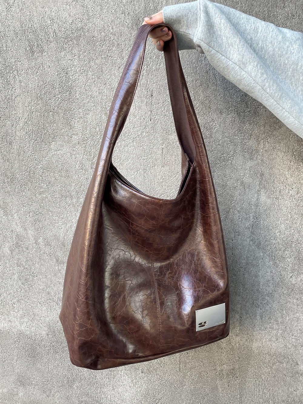 CryingCenter Crack Glossy Oil Wax Crossbody Bag