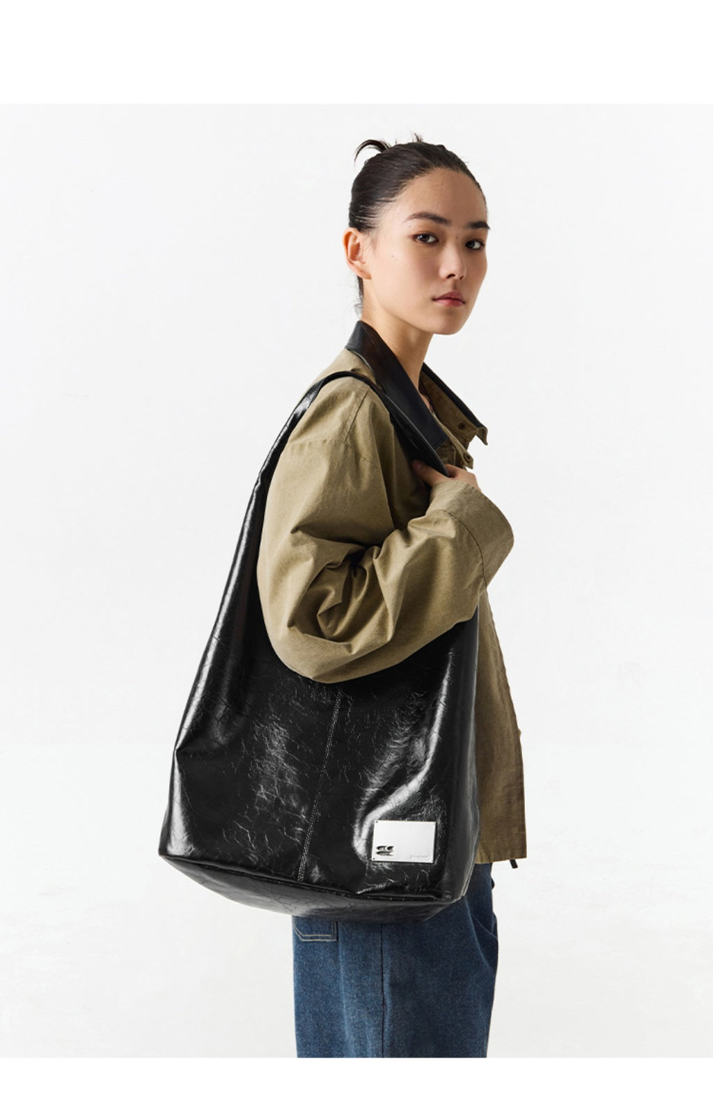 CryingCenter Crack Glossy Oil Wax Crossbody Bag