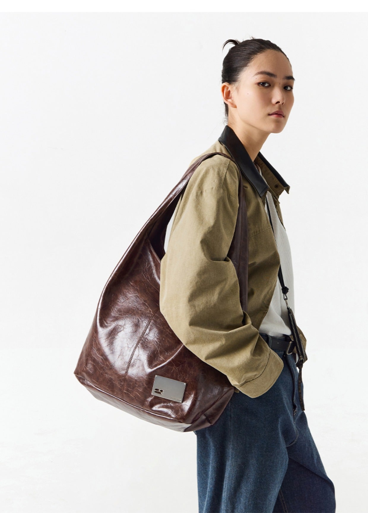 CryingCenter Crack Glossy Oil Wax Crossbody Bag