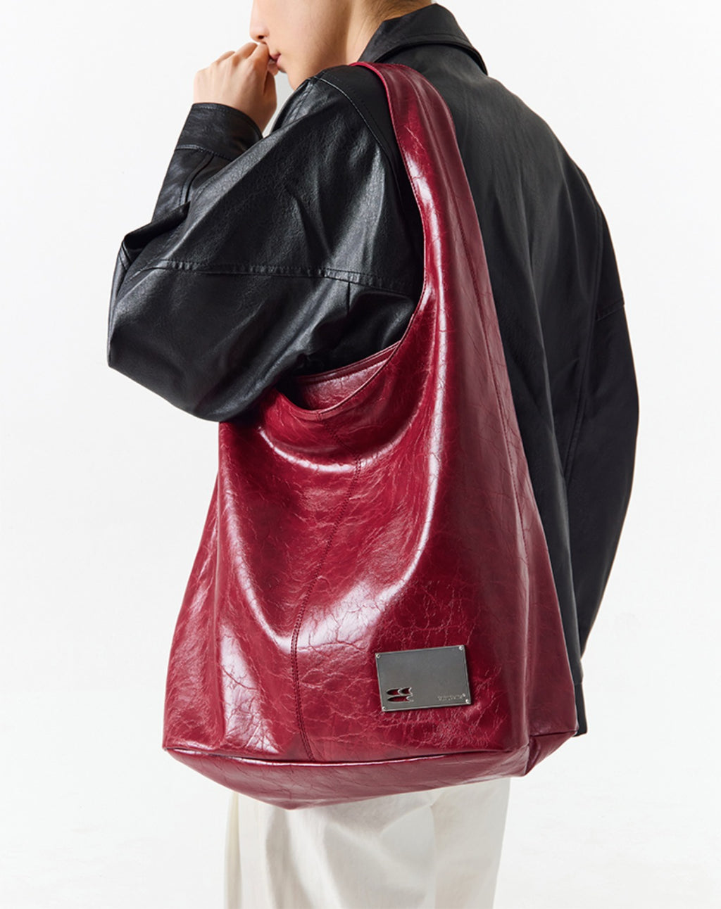 CryingCenter Crack Glossy Oil Wax Crossbody Bag